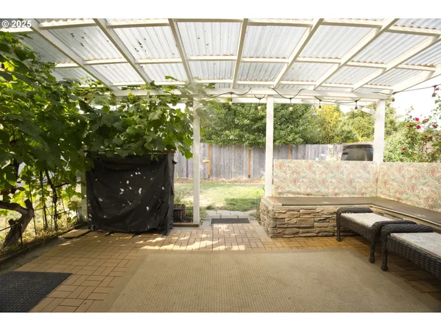 a living room with a couch and a table
