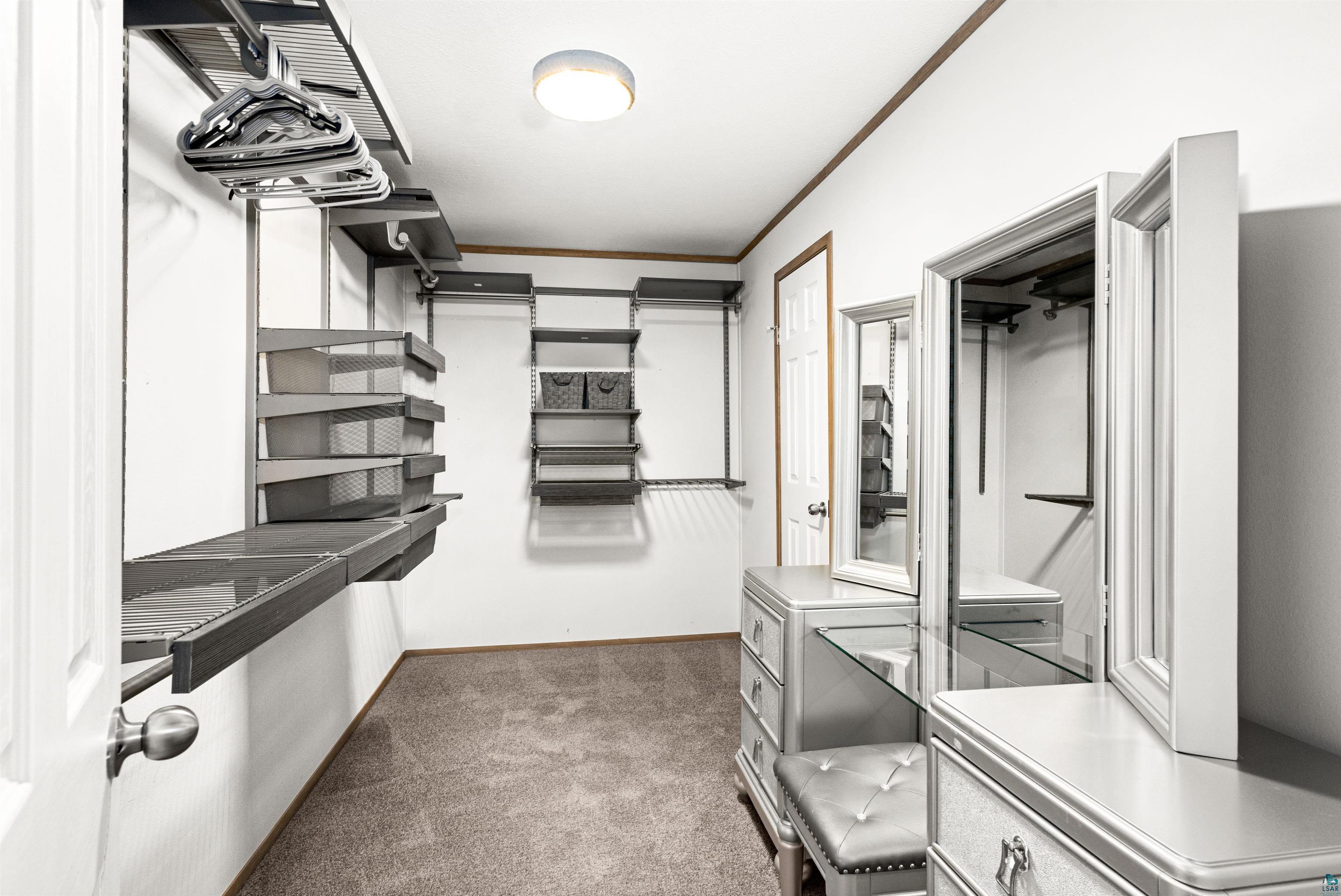 5562 Lavaque Road Duluth, MN 55803 - Photo 17 of 28 Walk in closet with dark colored carpet