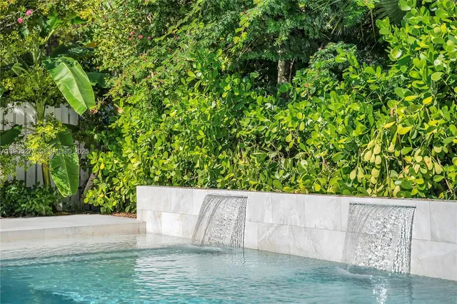 a view of a backyard with a garden