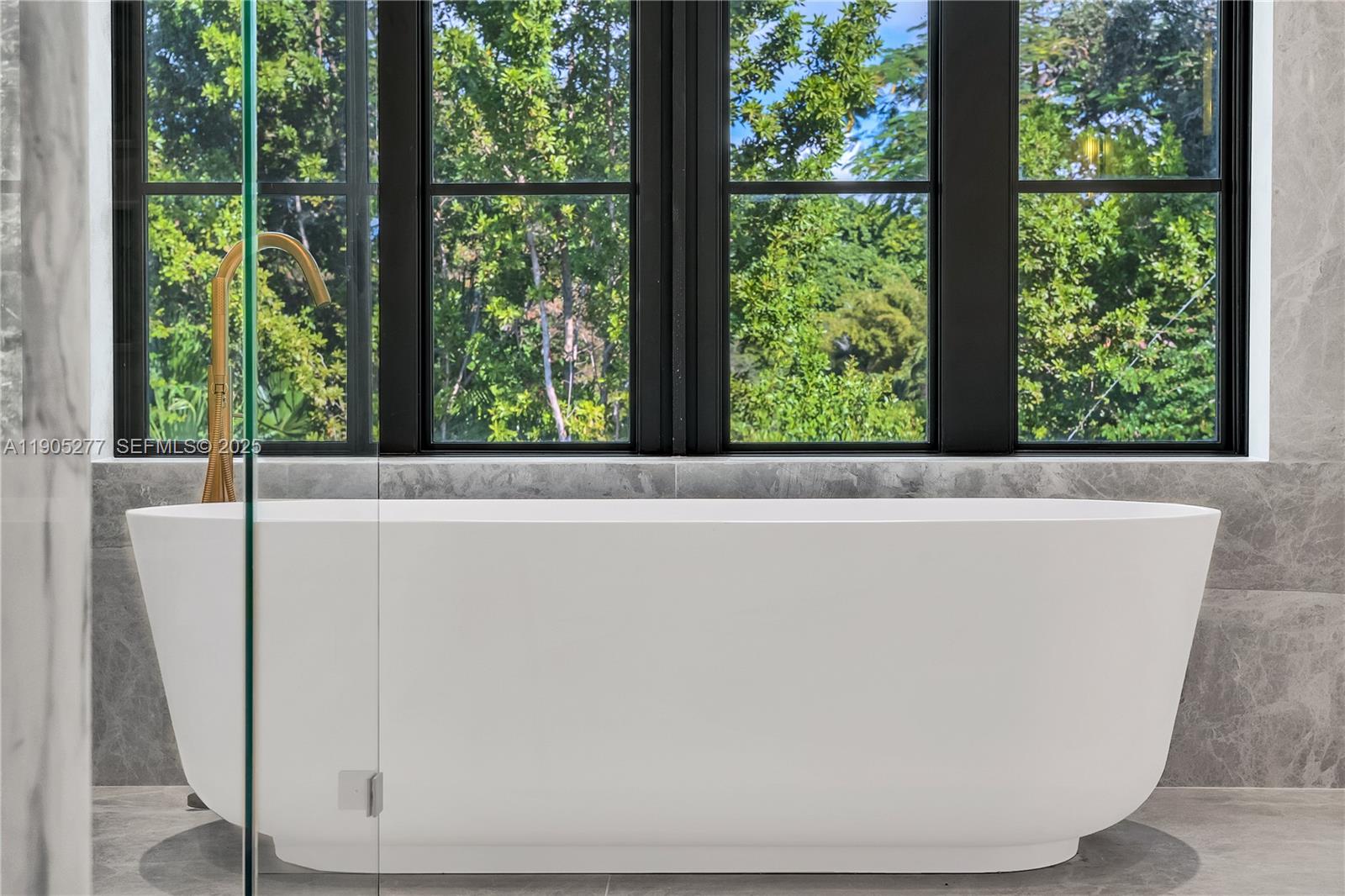4191 Battersea Road Miami, FL 33133 - Photo 21 of 27 a view of a bath tub sitting in a balcony