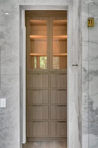 a bathroom with a bathtub and shower
