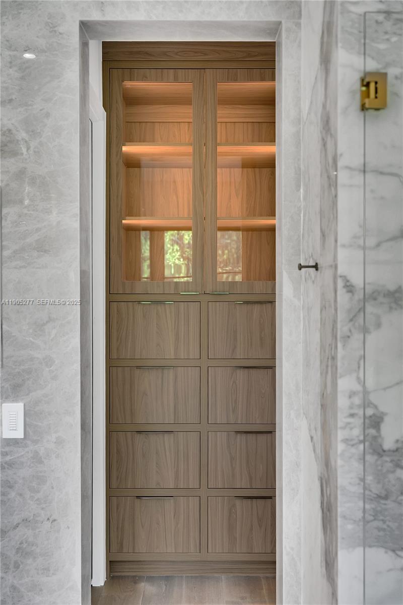 4191 Battersea Road Miami, FL 33133 - Photo 6 of 27 a view of a wooden door