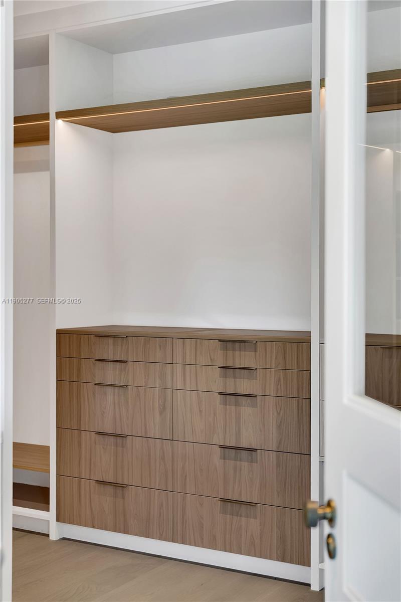 4191 Battersea Road Miami, FL 33133 - Photo 9 of 27 a bathroom with a shower