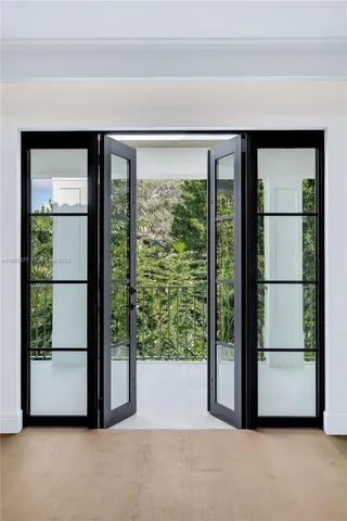 a stove top oven sitting inside of a kitchen