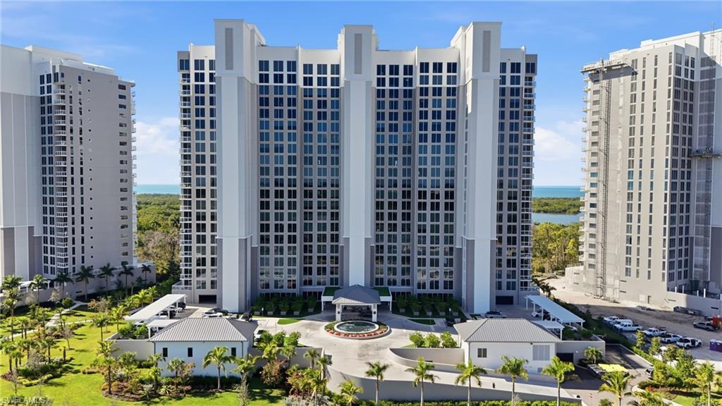 13945 Old Coast Road, Unit 1906 Naples, FL 34110 - Photo 40 of 40 a view of a city with tall buildings