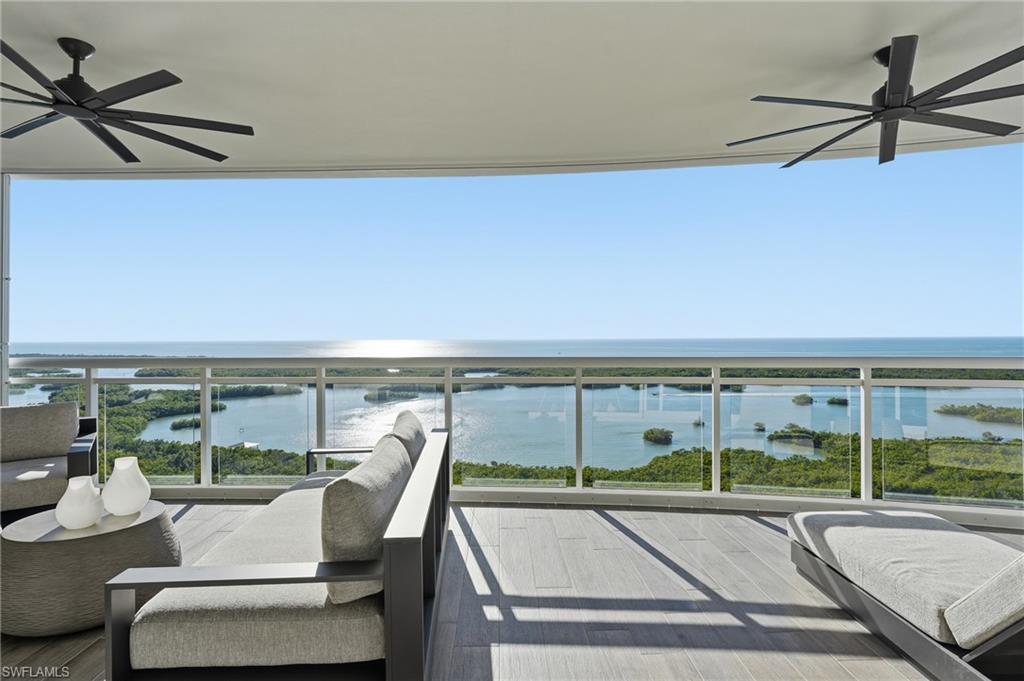 13945 Old Coast Road, Unit 1906 Naples, FL 34110 - Photo 4 of 40 a view of a terrace with skyline