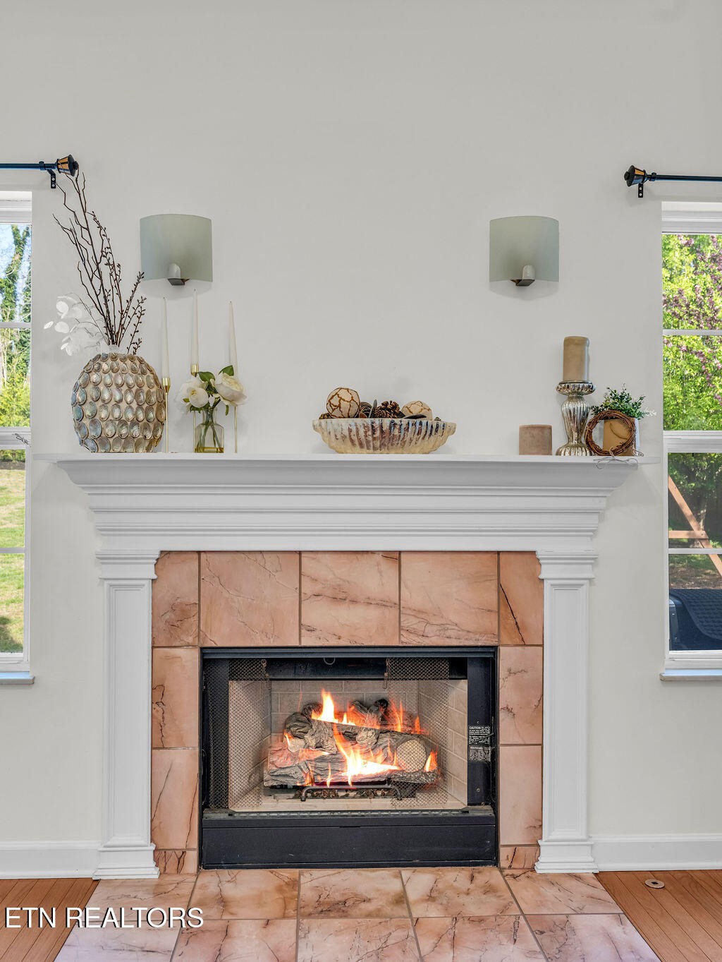 7425 Lawford Road Knoxville, TN 37919 - Photo 13 of 57 a fireplace with a vase on top of it