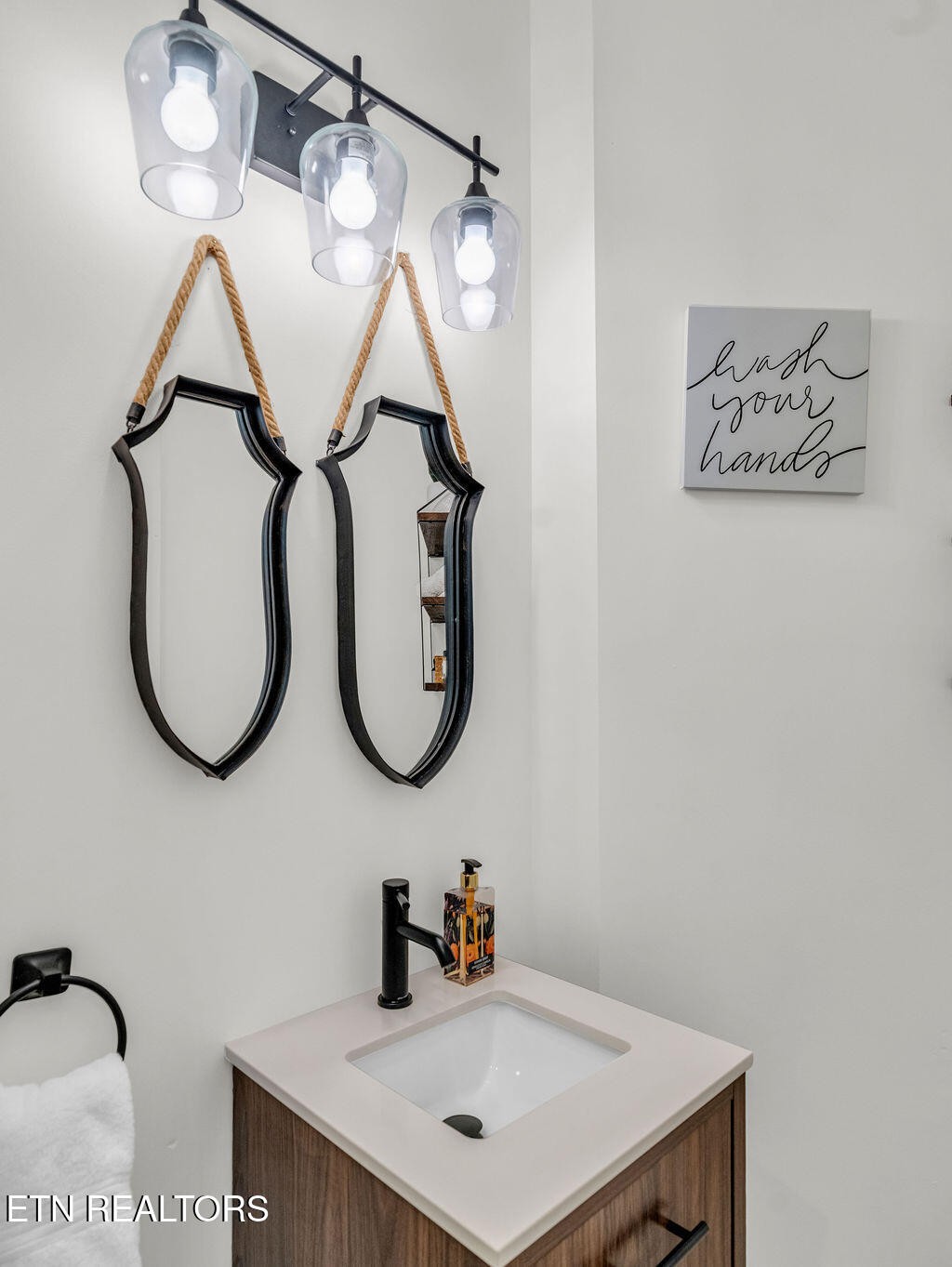 7425 Lawford Road Knoxville, TN 37919 - Photo 23 of 57 a bathroom with a sink and a mirror