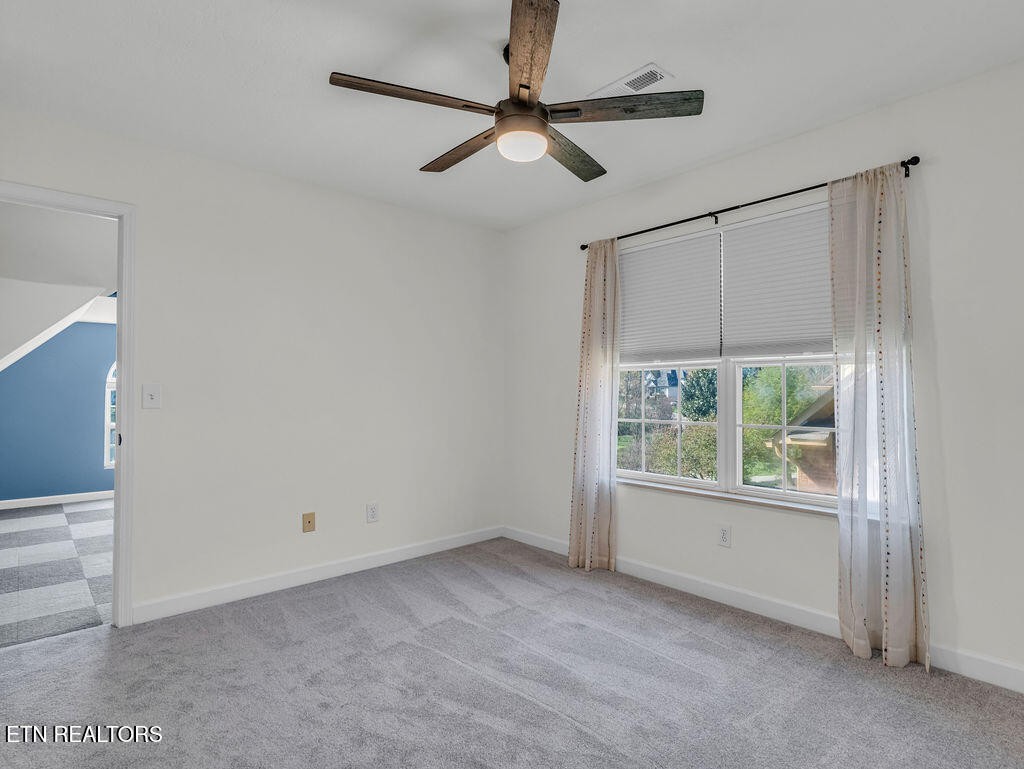7425 Lawford Road Knoxville, TN 37919 - Photo 32 of 57 an empty room with a window