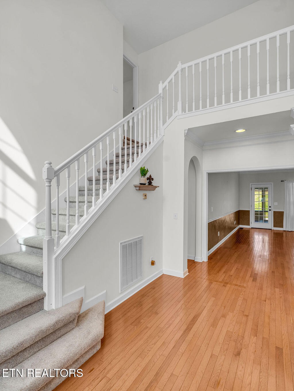 7425 Lawford Road Knoxville, TN 37919 - Photo 6 of 57 a view of entryway and hall with wooden floor