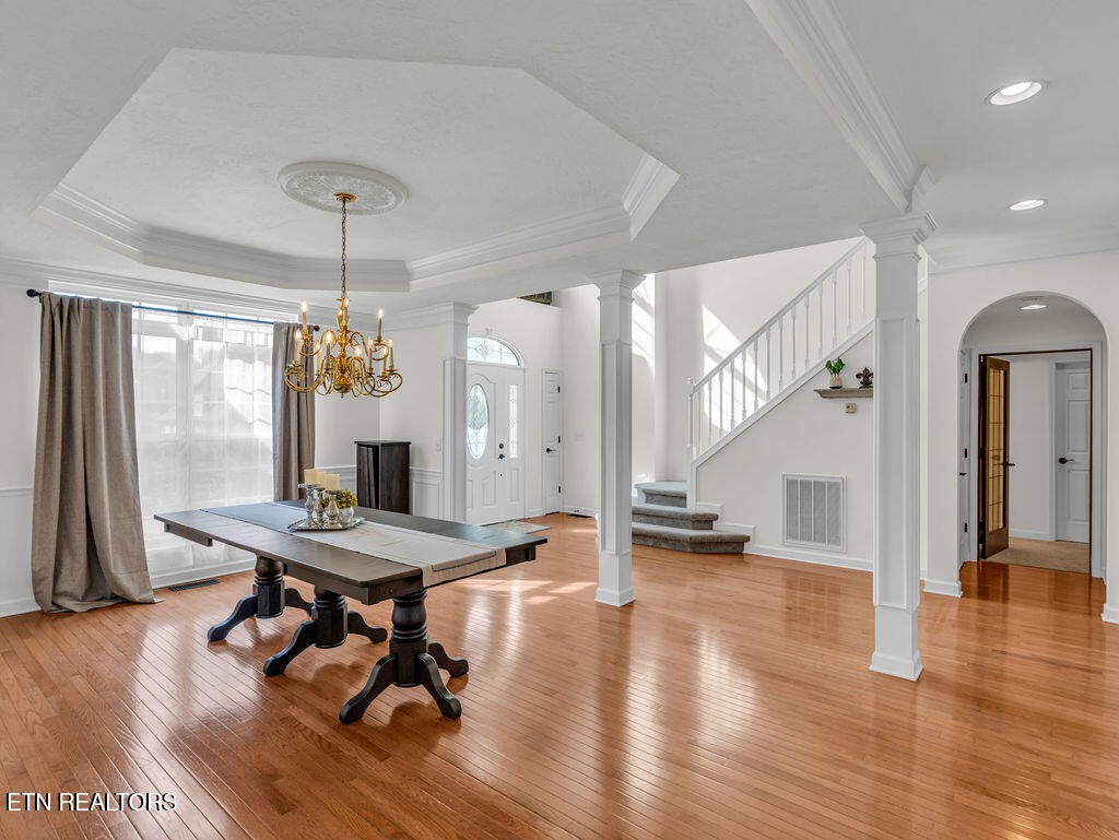 7425 Lawford Road Knoxville, TN 37919 - Photo 7 of 57 a room with lots of table and chairs