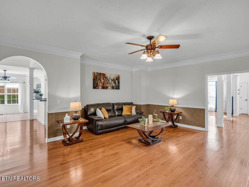 7425 Lawford Road Knoxville, TN 37919 - Photo 10 of 57 a living room with furniture and a chandelier