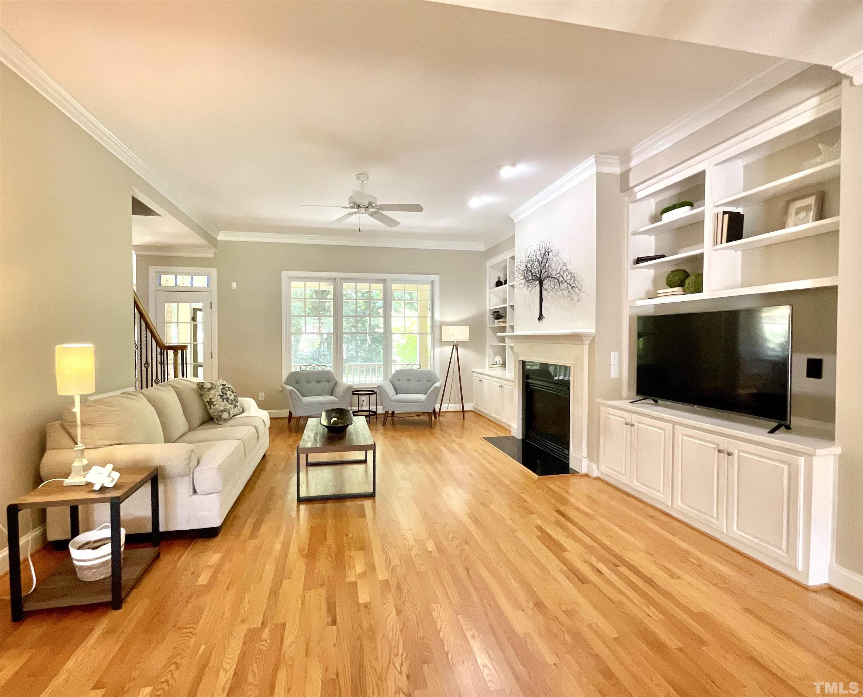 4300 Dula Street Durham, NC 27705 - Photo 11 of 42 a living room with furniture and a flat screen tv