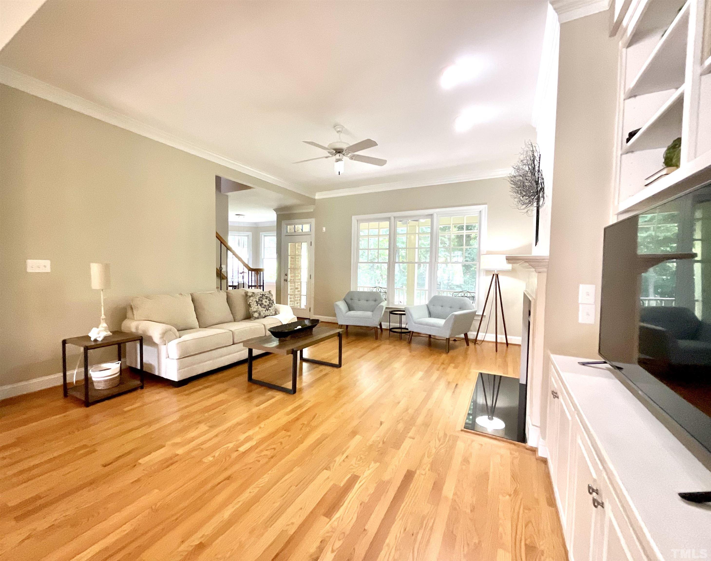 4300 Dula Street Durham, NC 27705 - Photo 12 of 42 a living room with furniture and a flat screen tv