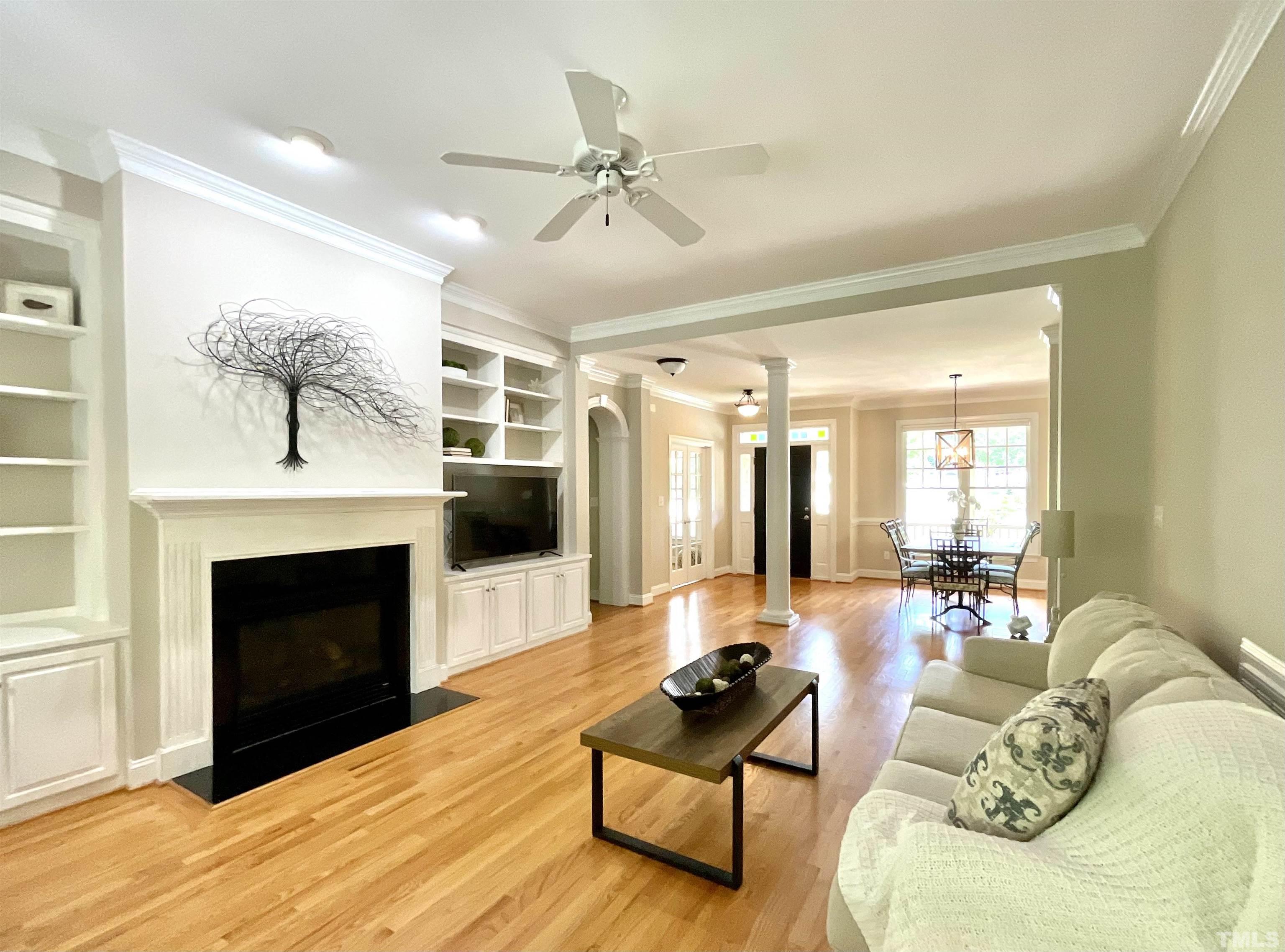 4300 Dula Street Durham, NC 27705 - Photo 14 of 42 a living room with furniture fireplace and flat screen tv