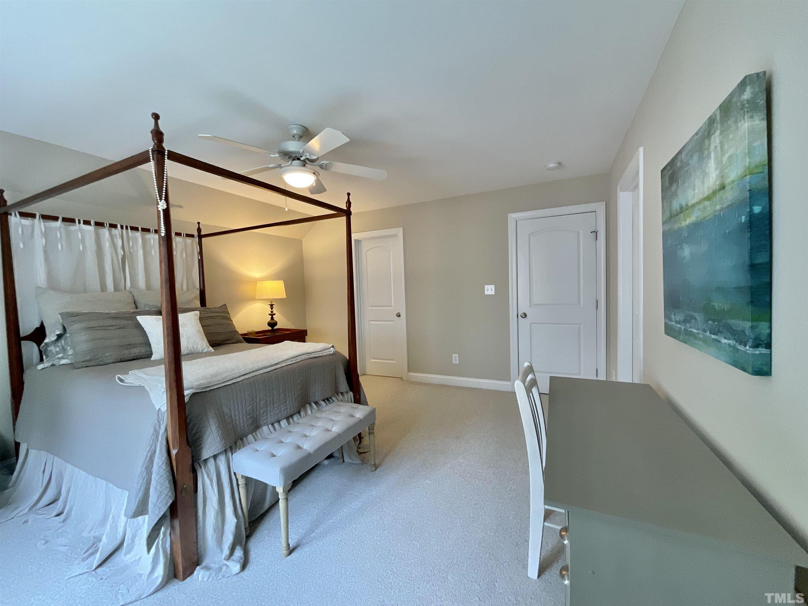 4300 Dula Street Durham, NC 27705 - Photo 25 of 42 a bedroom with a bed window and outdoor view