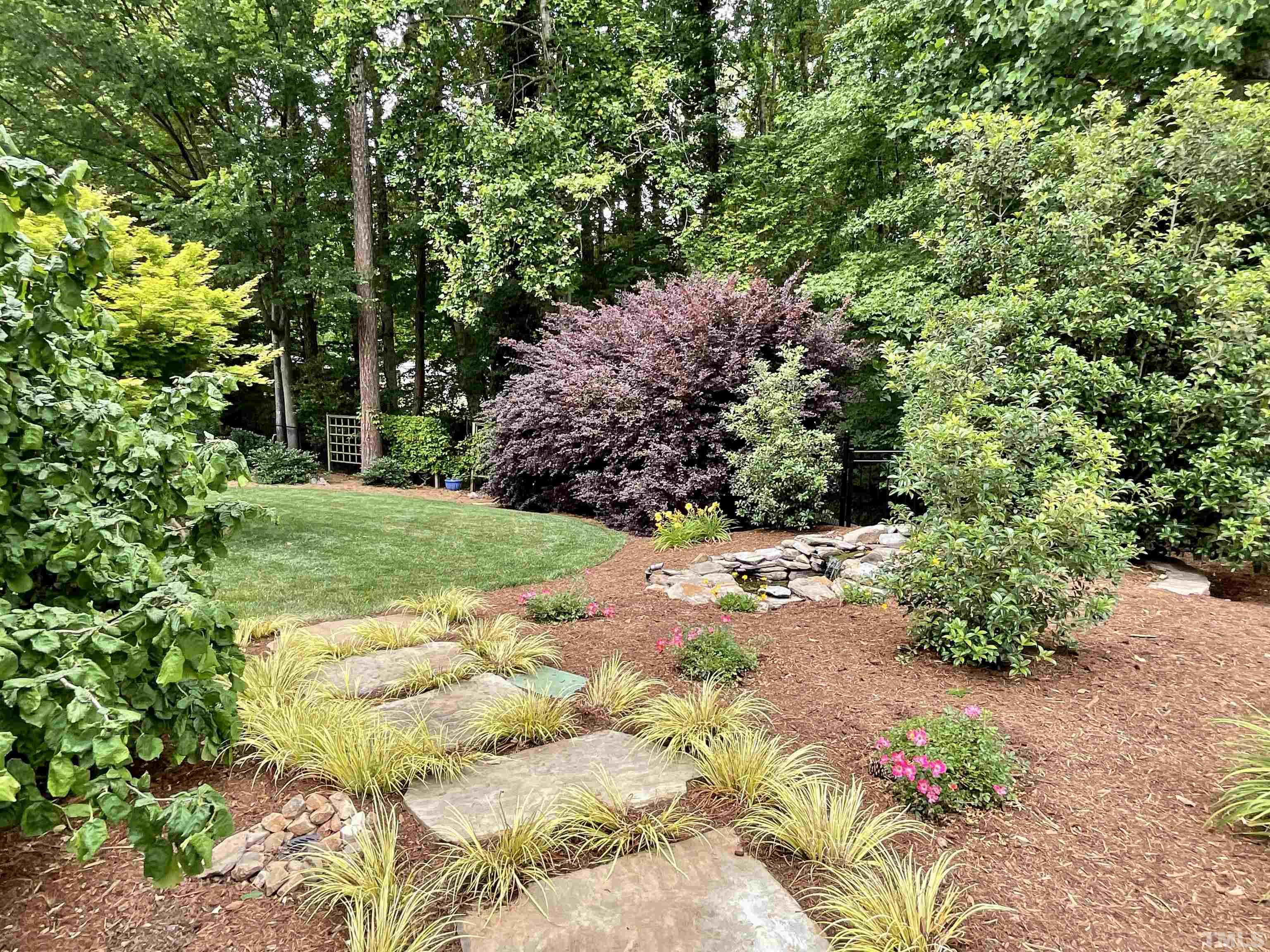 4300 Dula Street Durham, NC 27705 - Photo 34 of 42 a view of a garden with plants