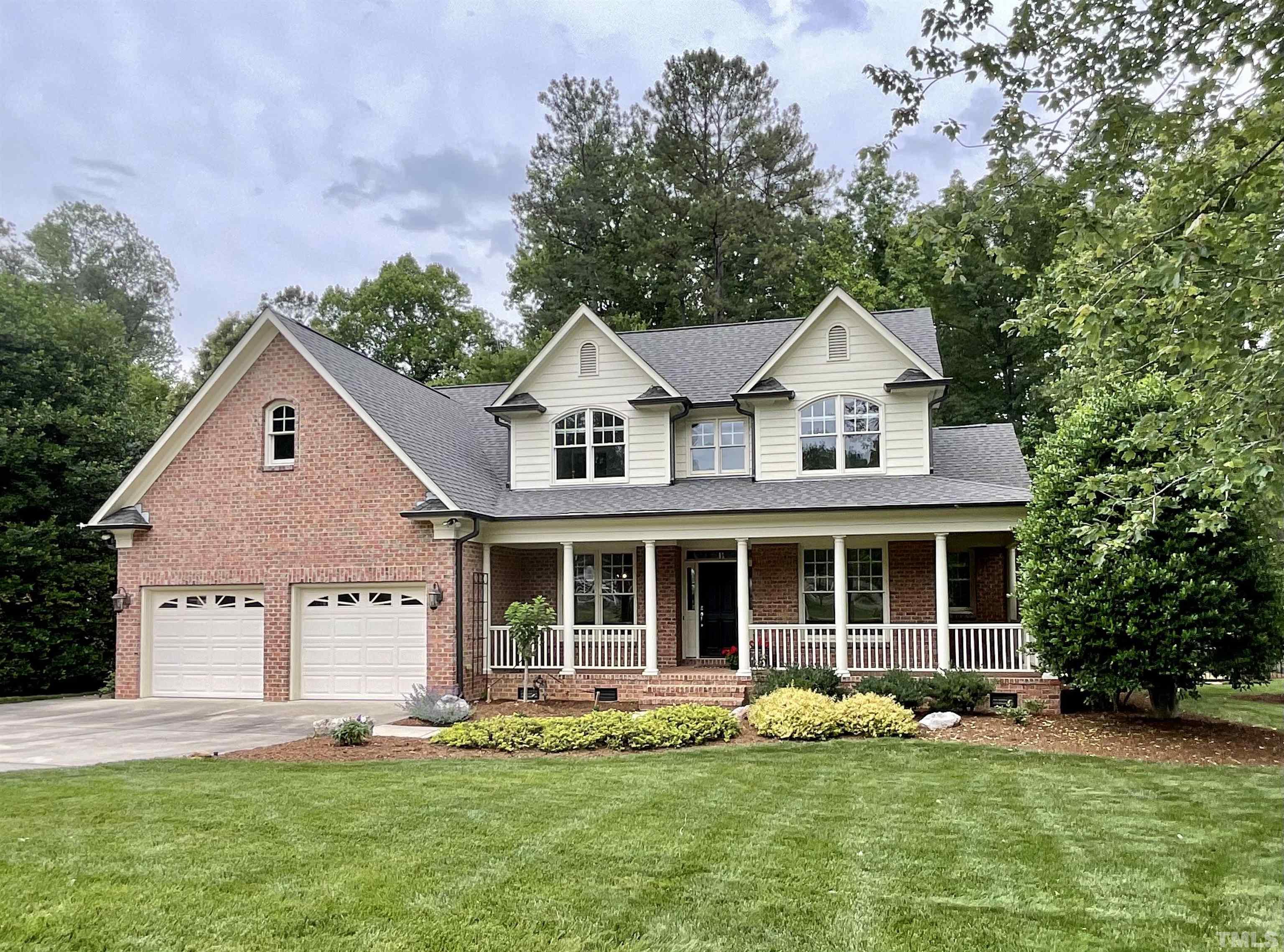 4300 Dula Street Durham, NC 27705 - Photo 42 of 42 a front view of a house with a yard and porch