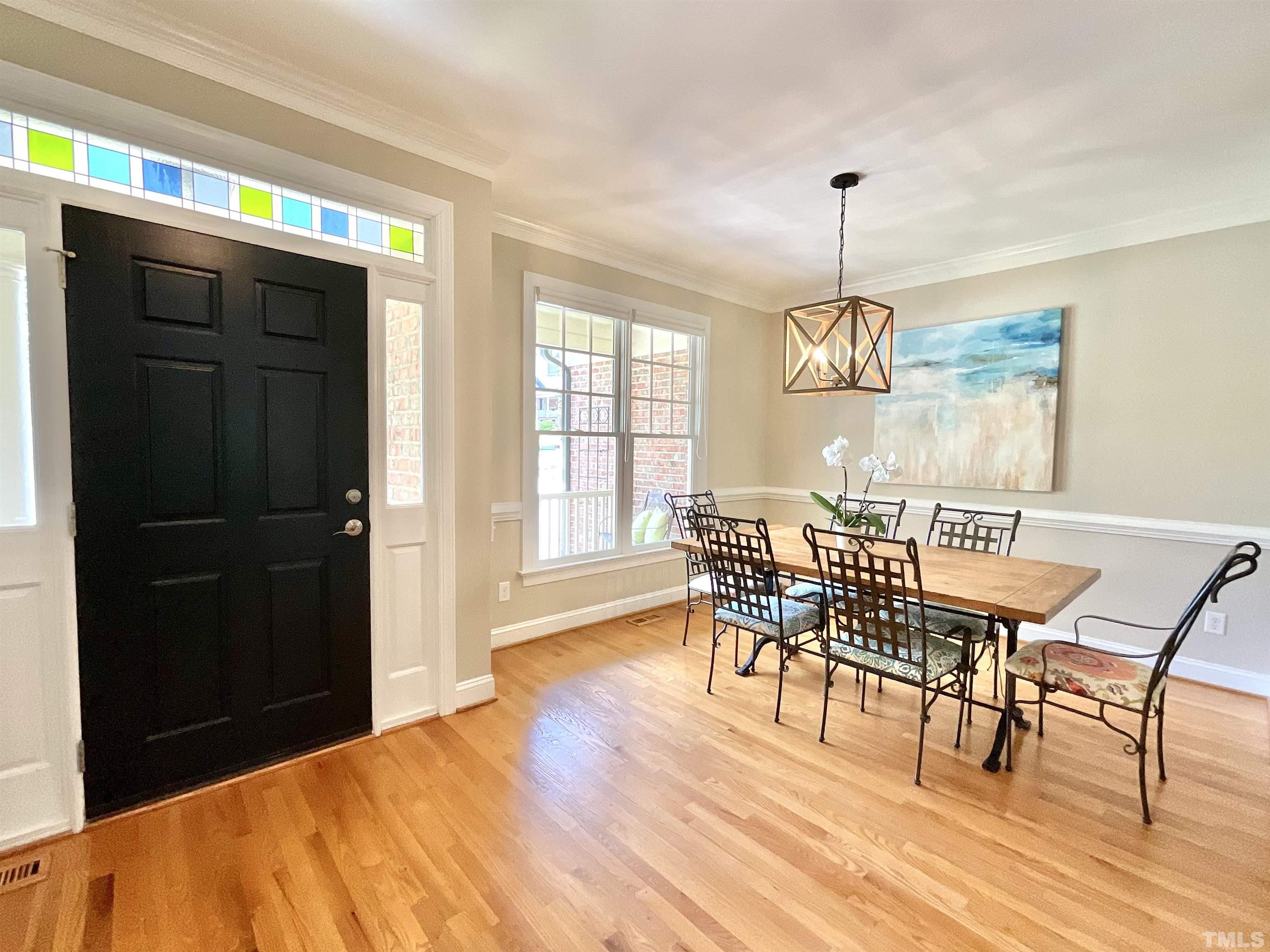 4300 Dula Street Durham, NC 27705 - Photo 8 of 42 a view of a dining room with furniture window and wooden floor