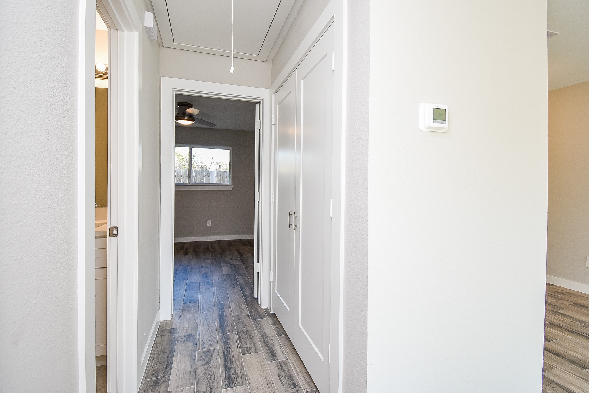 6522 De Priest Street, Unit B Houston, TX 77091 - Photo 12 of 22 Hall to bed, bath, and laundry rooms