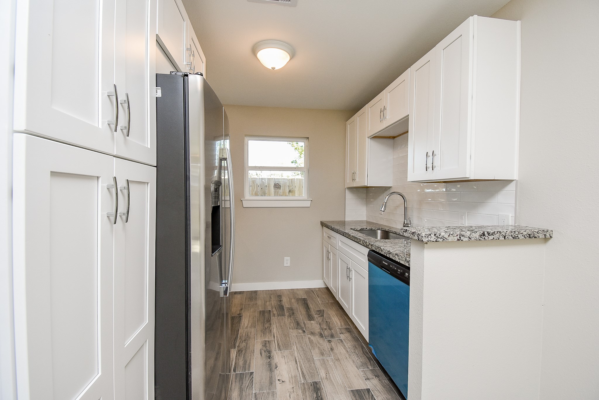 6522 De Priest Street, Unit B Houston, TX 77091 - Photo 5 of 22 View to kitchen