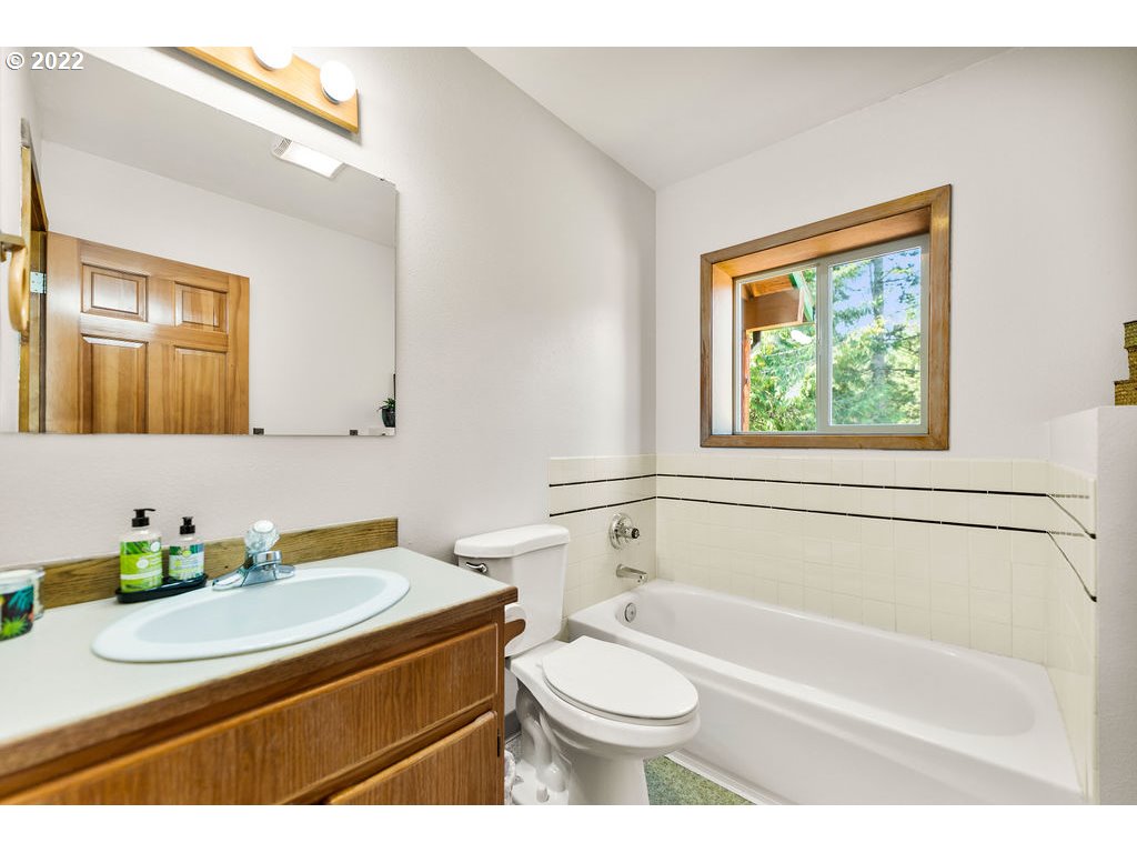 19111 Southeast Langensand Road Sandy, OR 97055 - Photo 11 of 31 a bathroom with a granite countertop sink toilet and shower