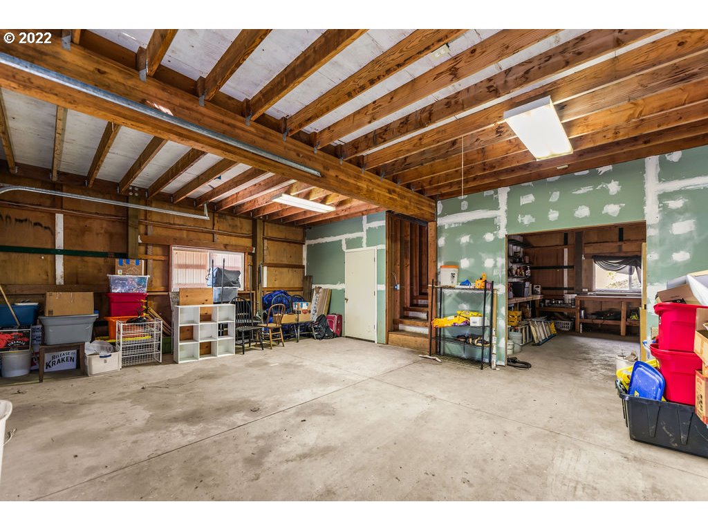 19111 Southeast Langensand Road Sandy, OR 97055 - Photo 27 of 31 a view of a garage with a table and chairs