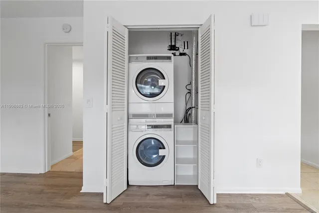 a utility room with dryer and washer