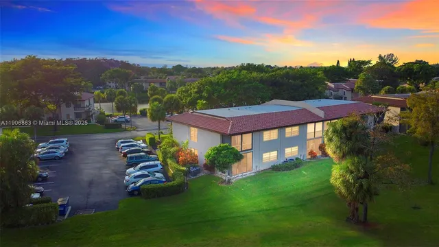 an aerial view of a house with a garden