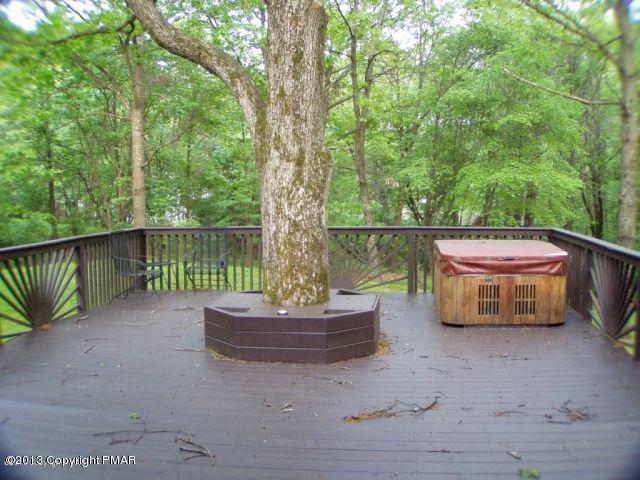 127 Mikes Road Bartonsville, PA 18321 - Photo 8 of 30 a backyard of a house with fountain table and chairs