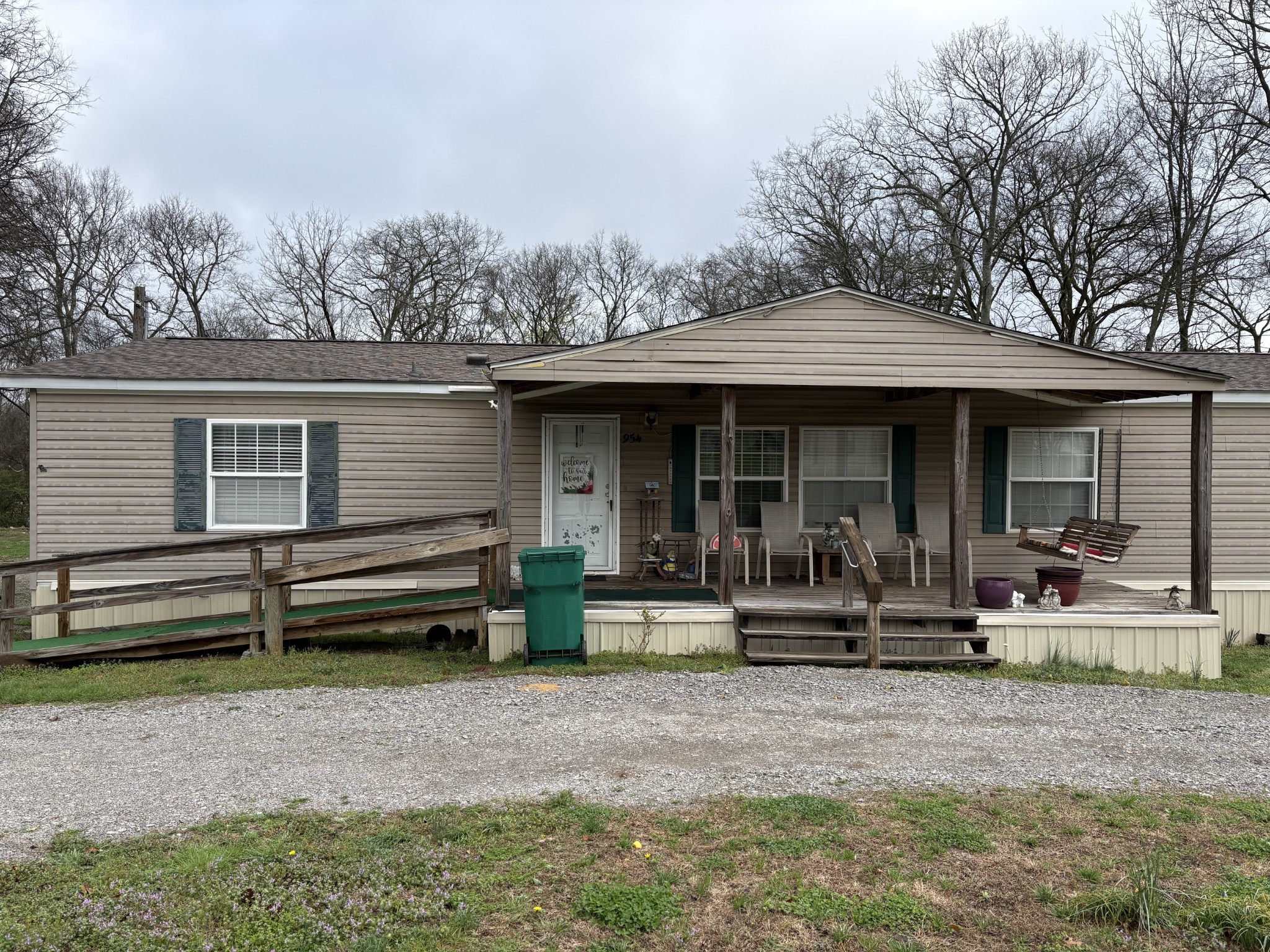 954 Old Belfast Road Lewisburg, TN 37091 - Photo 1 of 5 a front view of a house with outdoor seating