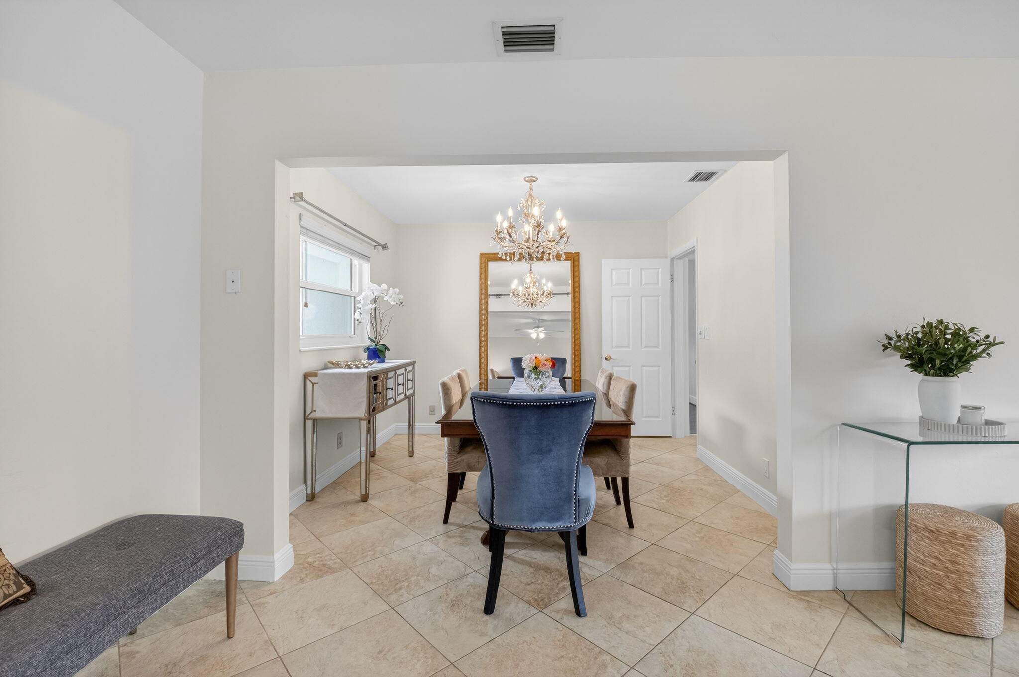 400 East Conference Drive Boca Raton, FL 33486 - Photo 11 of 41 a view of a dining room with furniture and window