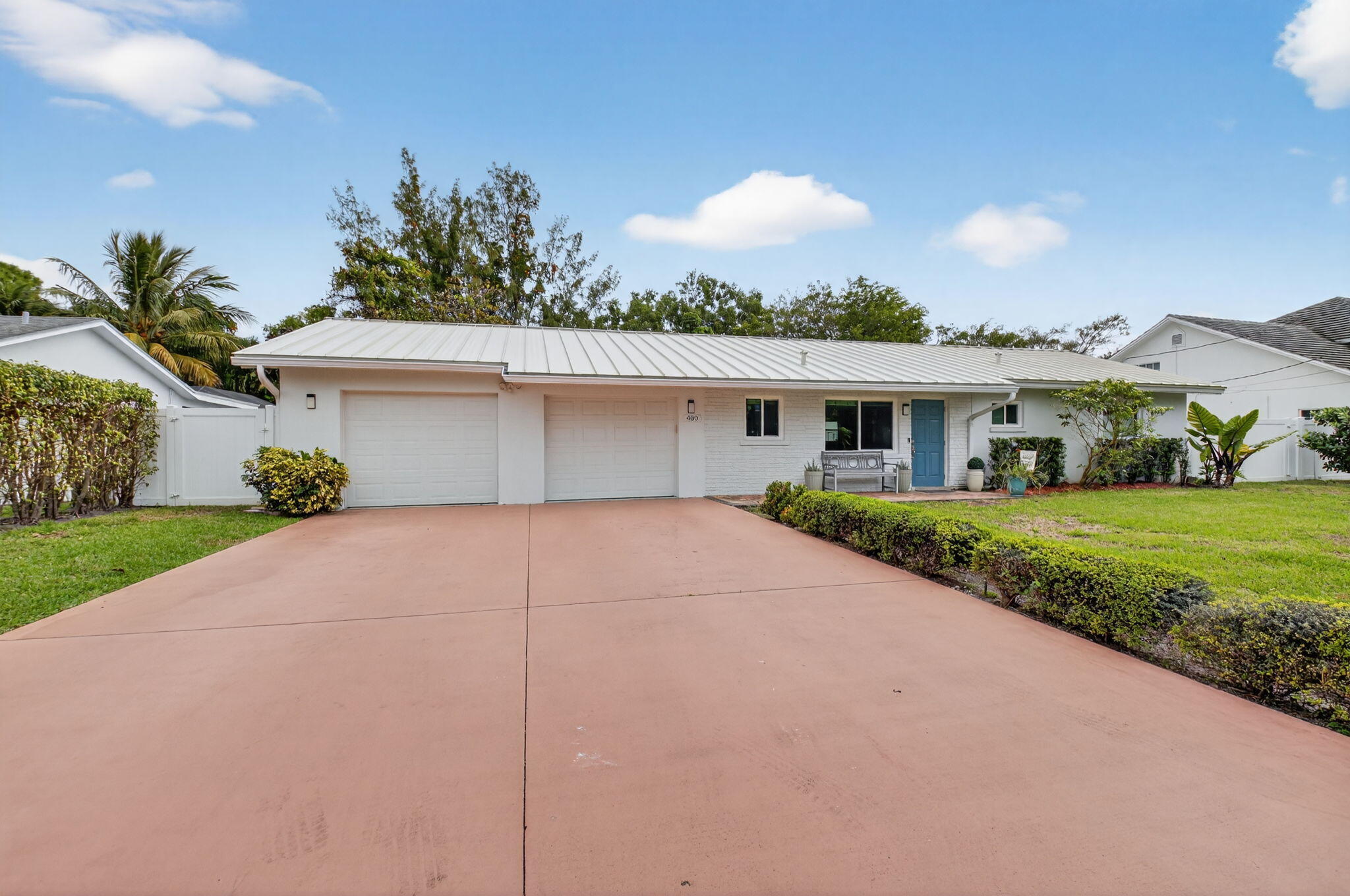 400 East Conference Drive Boca Raton, FL 33486 - Photo 3 of 41 a view of house and outdoor space