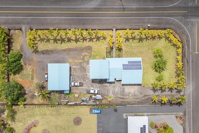 a bathroom with a granite countertop window and a sink