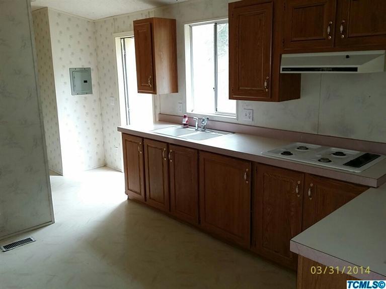 45472 Hammond Drive Three Rivers, CA 93271 - Photo 12 of 13 a kitchen with a sink and a window