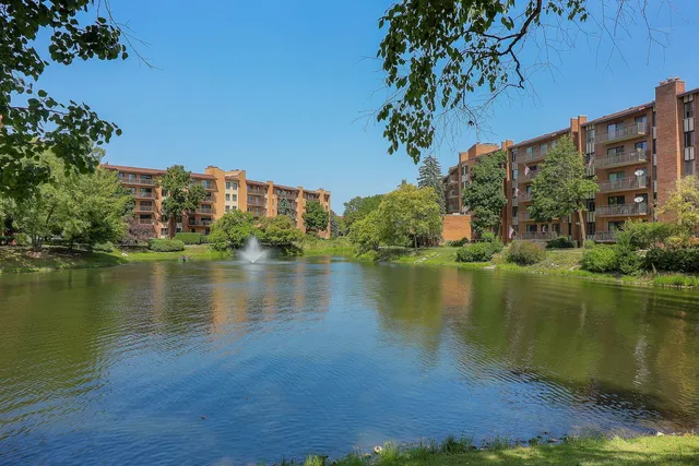 a view of a lake with a building in the background