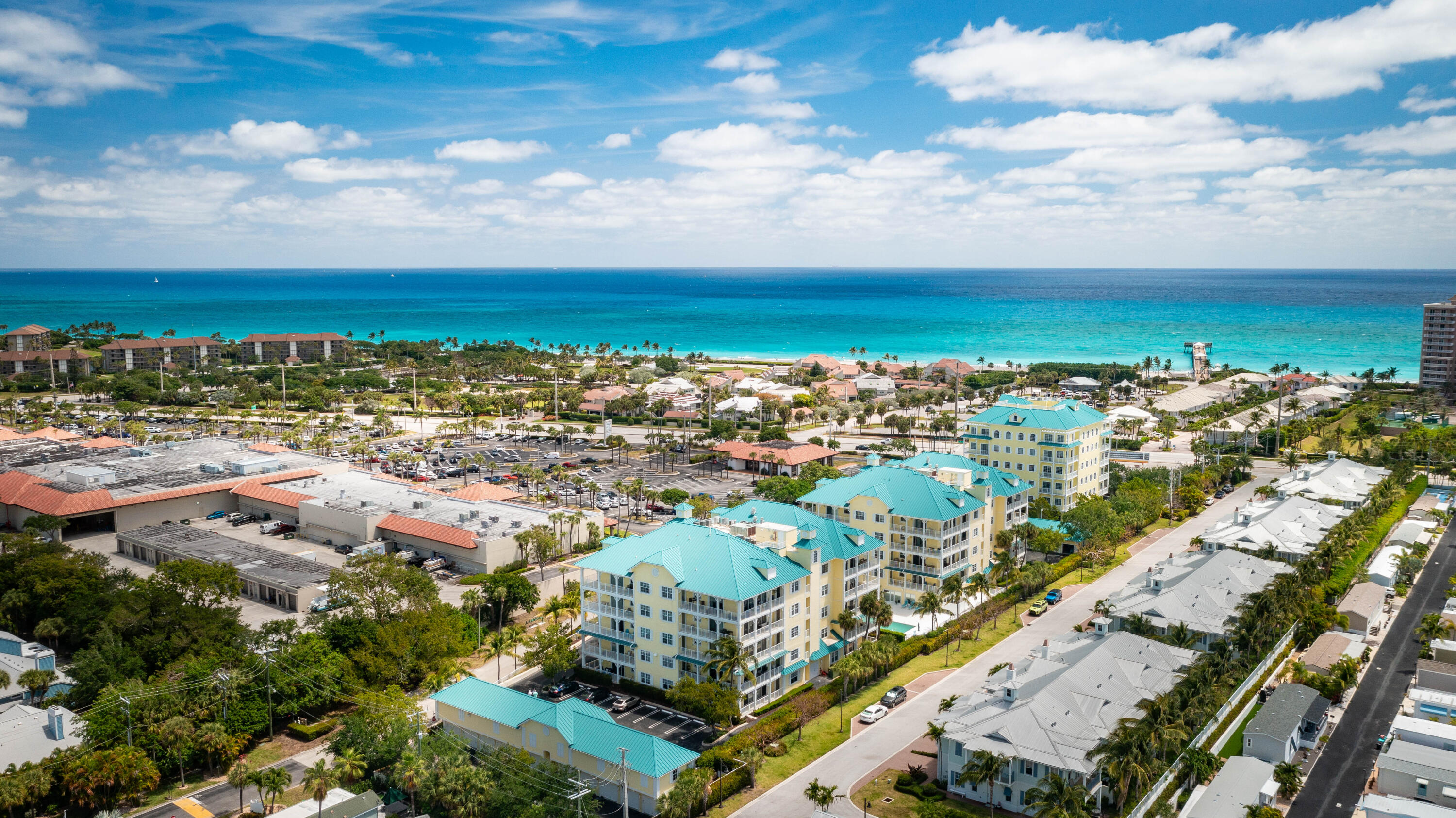 810 Juno Ocean Walk, Unit 401B Juno Beach, FL 33408 - Photo 49 of 57 an aerial view of residential building with outdoor space