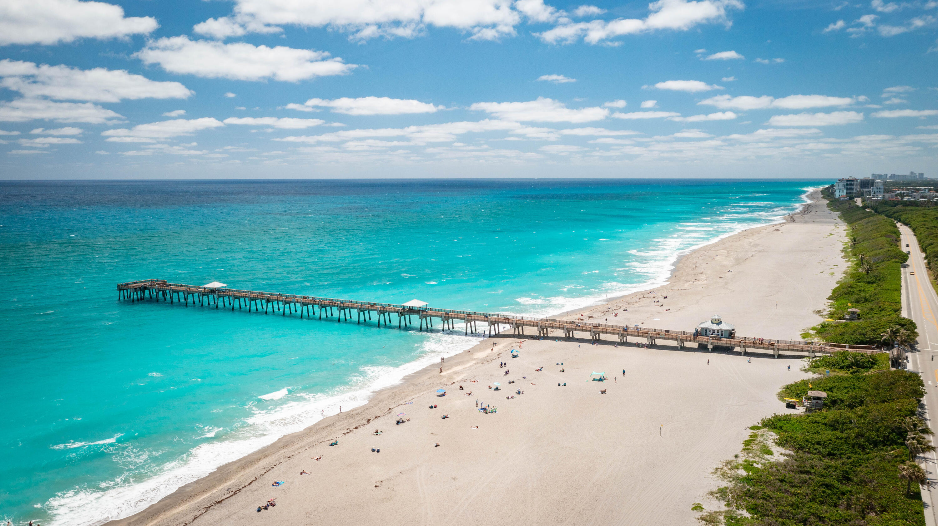 810 Juno Ocean Walk, Unit 401B Juno Beach, FL 33408 - Photo 56 of 57 a view of a lake and a yard