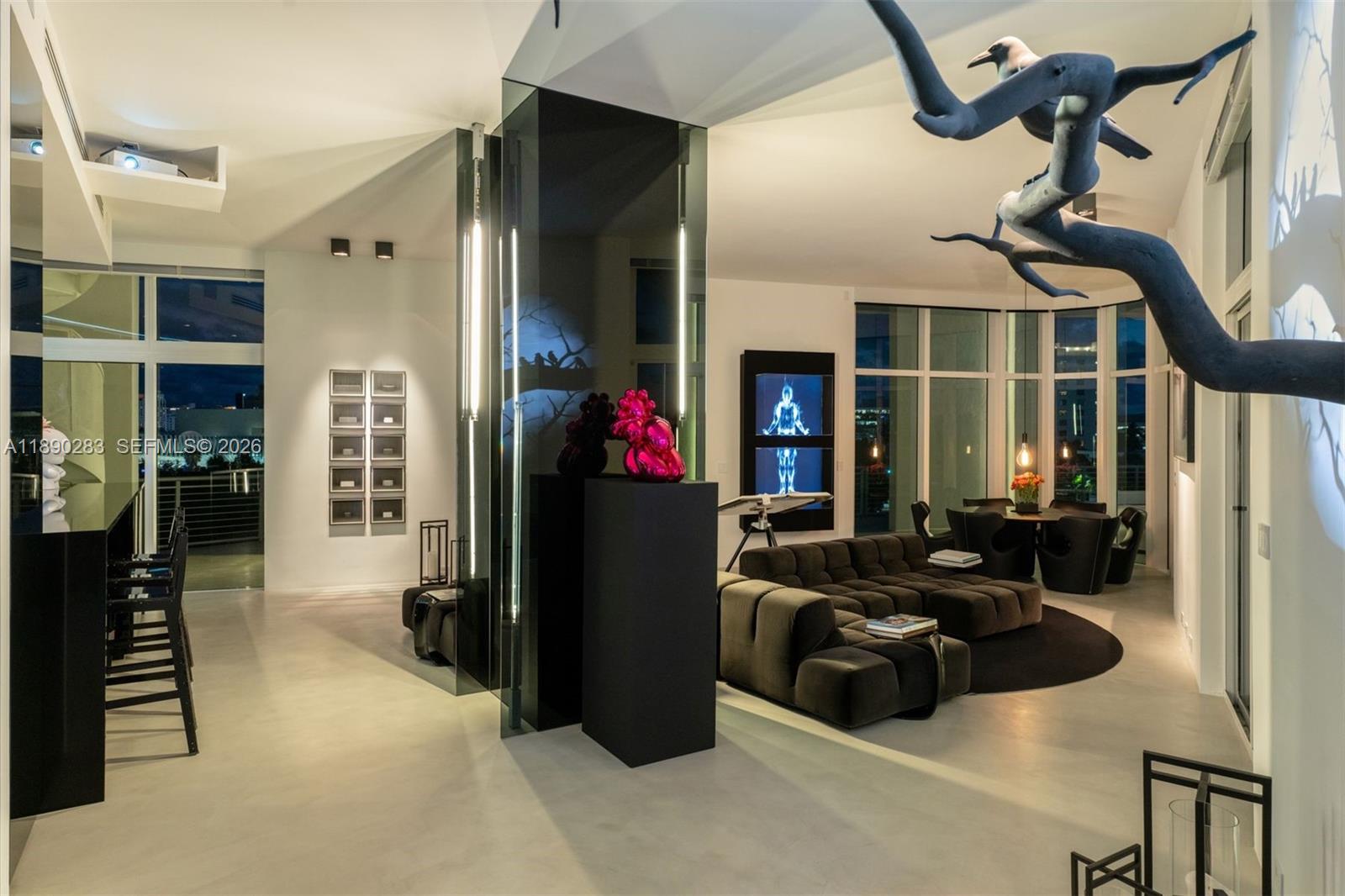 2001 Meridian Avenue, Unit PH01 Miami Beach, FL 33139 - Photo 17 of 63 a kitchen with a refrigerator and a sink