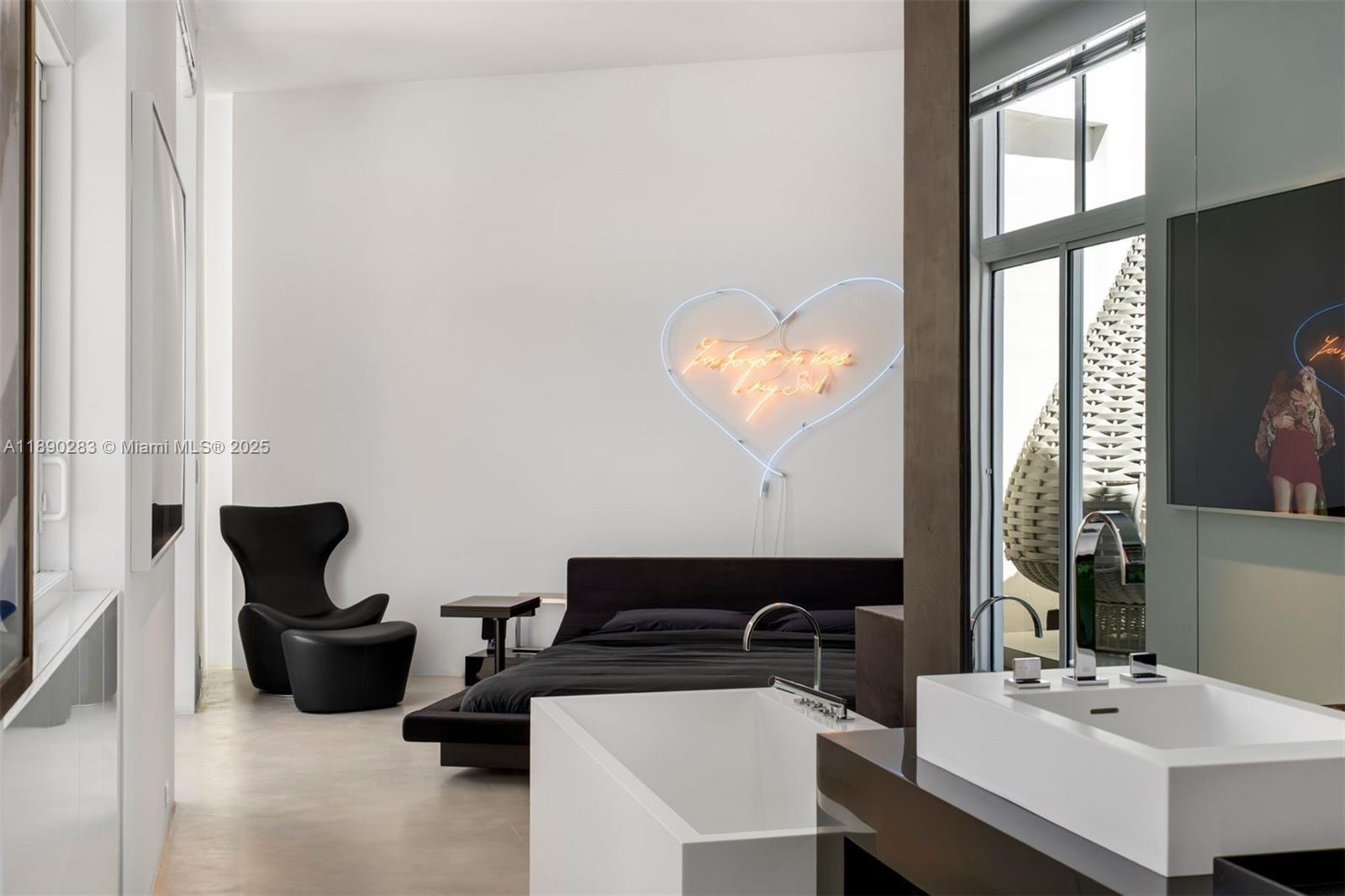 2001 Meridian Avenue, Unit PH01 Miami Beach, FL 33139 - Photo 19 of 63 a bathroom with a sink and a mirror