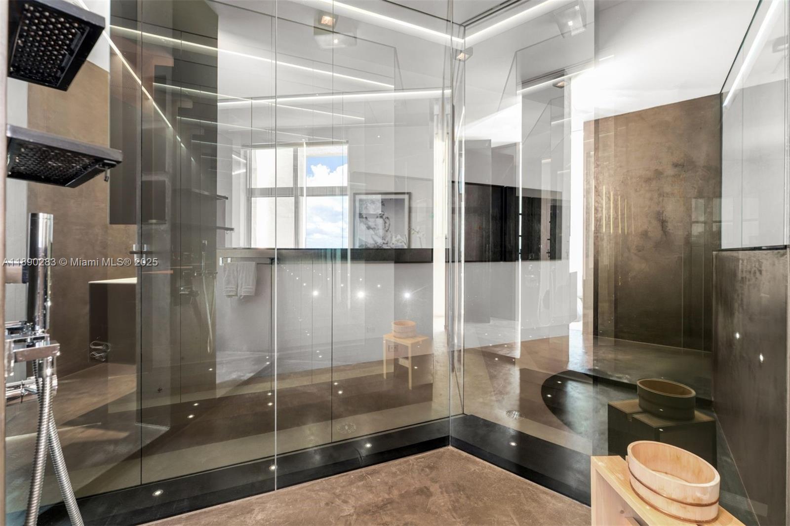 2001 Meridian Avenue, Unit PH01 Miami Beach, FL 33139 - Photo 24 of 63 a bathroom with a glass shower door