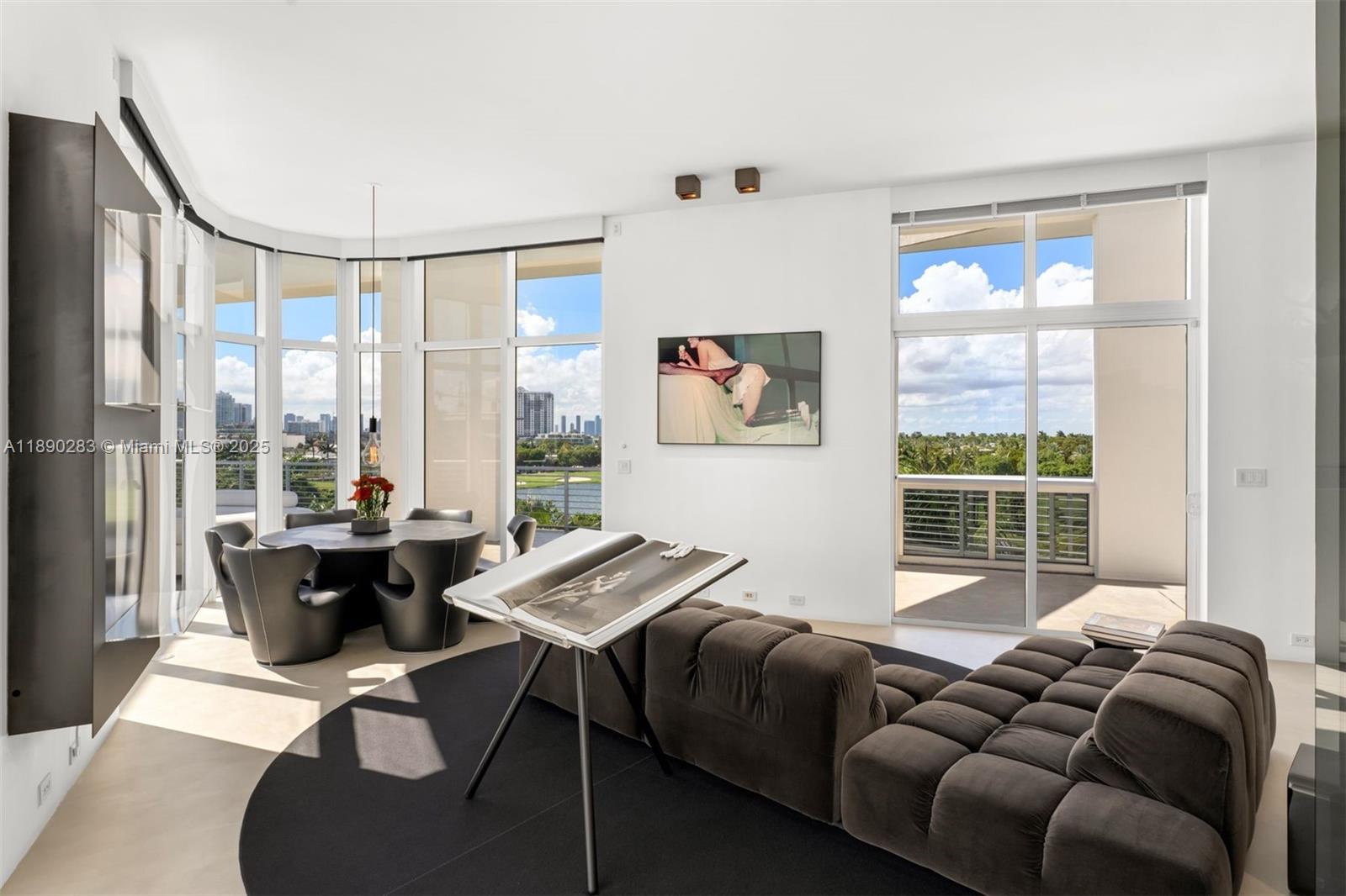 2001 Meridian Avenue, Unit PH01 Miami Beach, FL 33139 - Photo 4 of 63 a living room with furniture and a window
