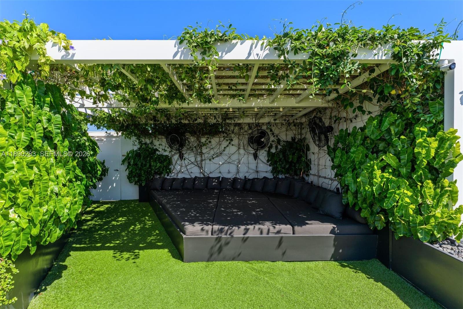 2001 Meridian Avenue, Unit PH01 Miami Beach, FL 33139 - Photo 54 of 63 a view of a garden with a fountain