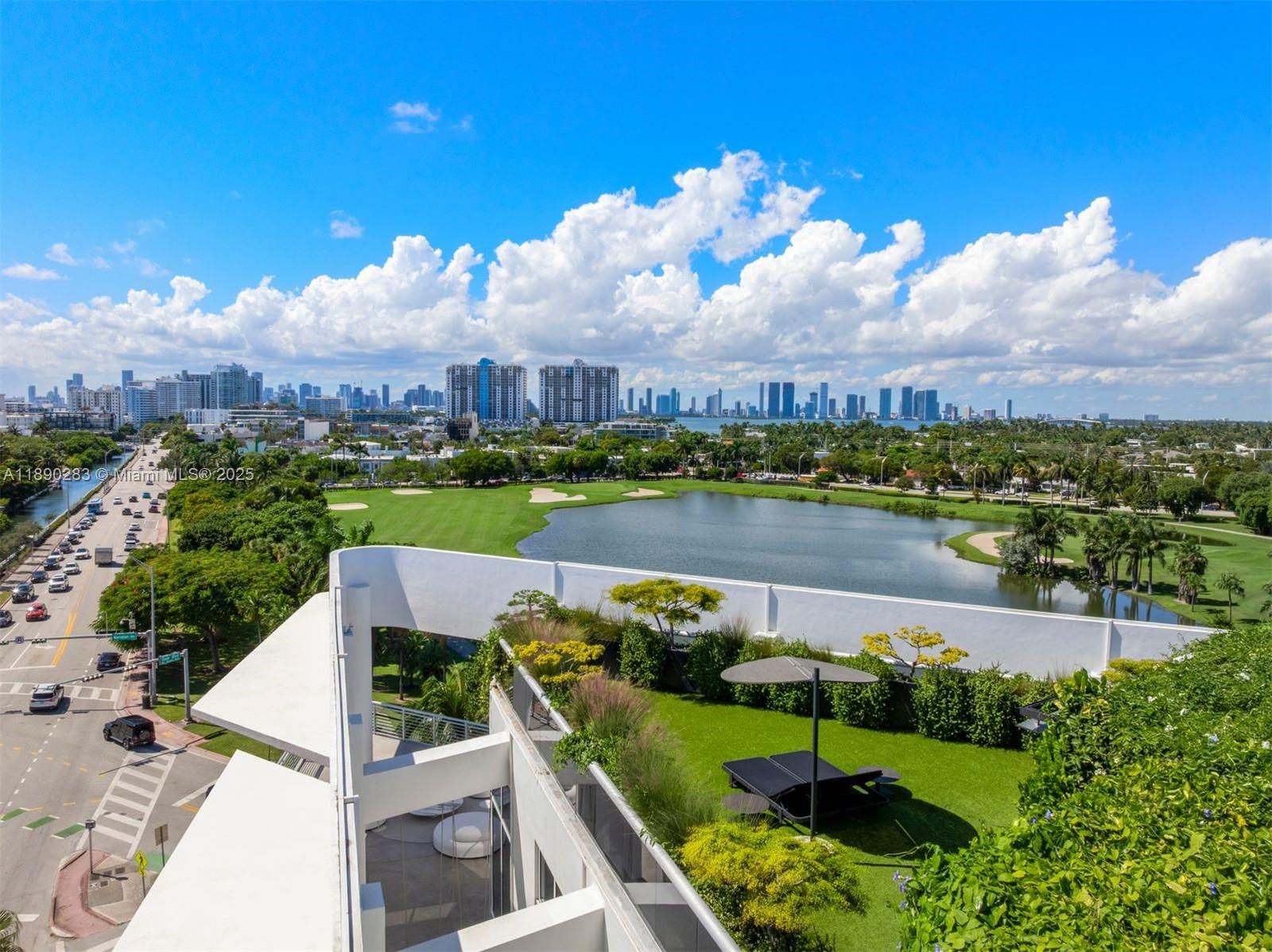 2001 Meridian Avenue, Unit PH01 Miami Beach, FL 33139 - Photo 58 of 63 an aerial view of a house with garden space and outdoor seating