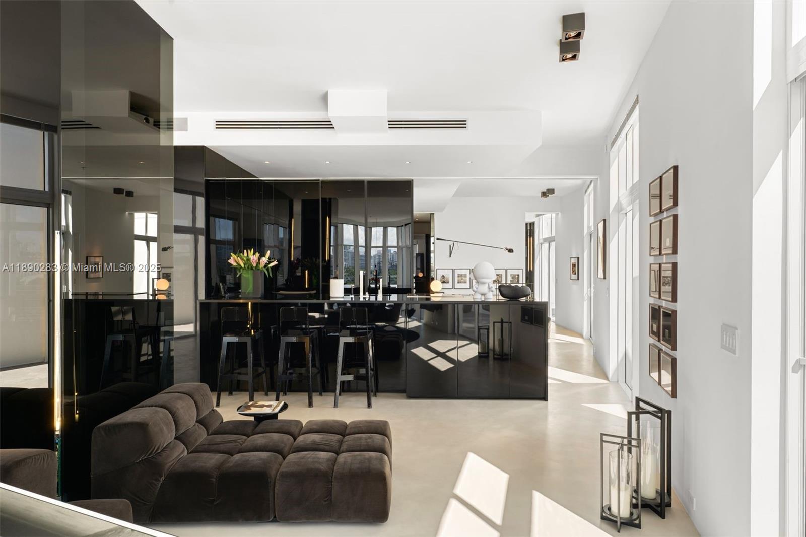 2001 Meridian Avenue, Unit PH01 Miami Beach, FL 33139 - Photo 6 of 63 a living room with stainless steel appliances kitchen island granite countertop furniture and a view of living room