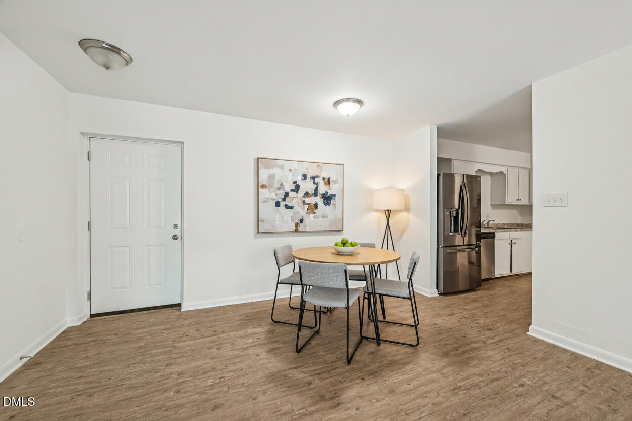 642 Pine Ridge Place Raleigh, NC 27609 - Photo 2 of 17 chat_staged_6-web-or-mls-Pine Ridge Pl-S