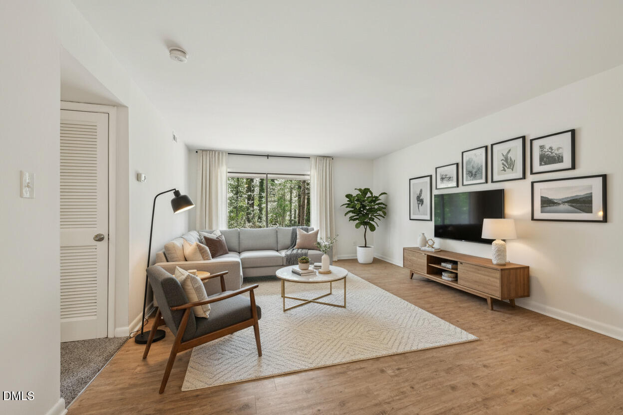 642 Pine Ridge Place Raleigh, NC 27609 - Photo 4 of 17 chat_staged_8-web-or-mls-Pine Ridge Pl-S