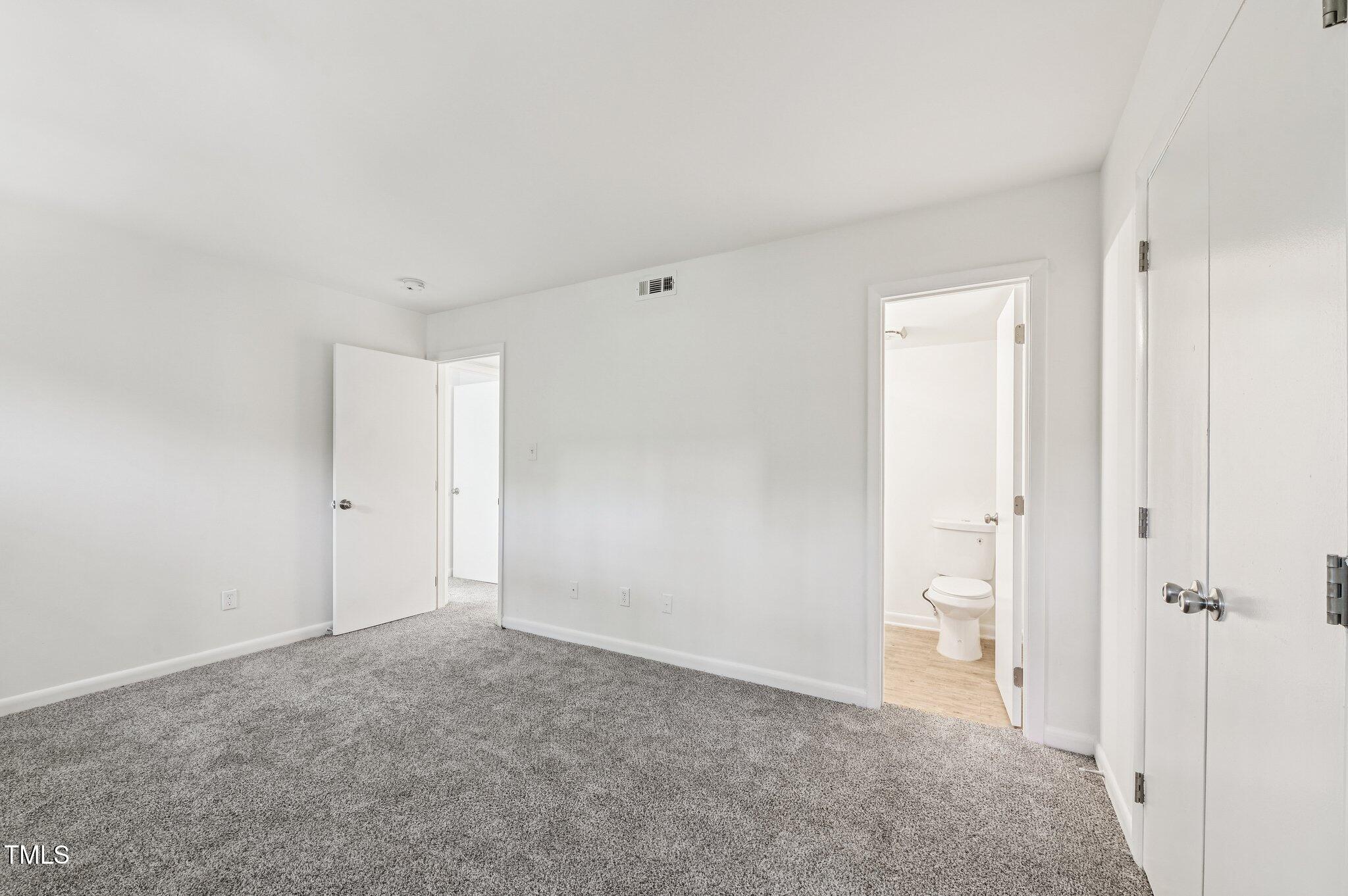 642 Pine Ridge Place Raleigh, NC 27609 - Photo 8 of 15 a view of an empty room