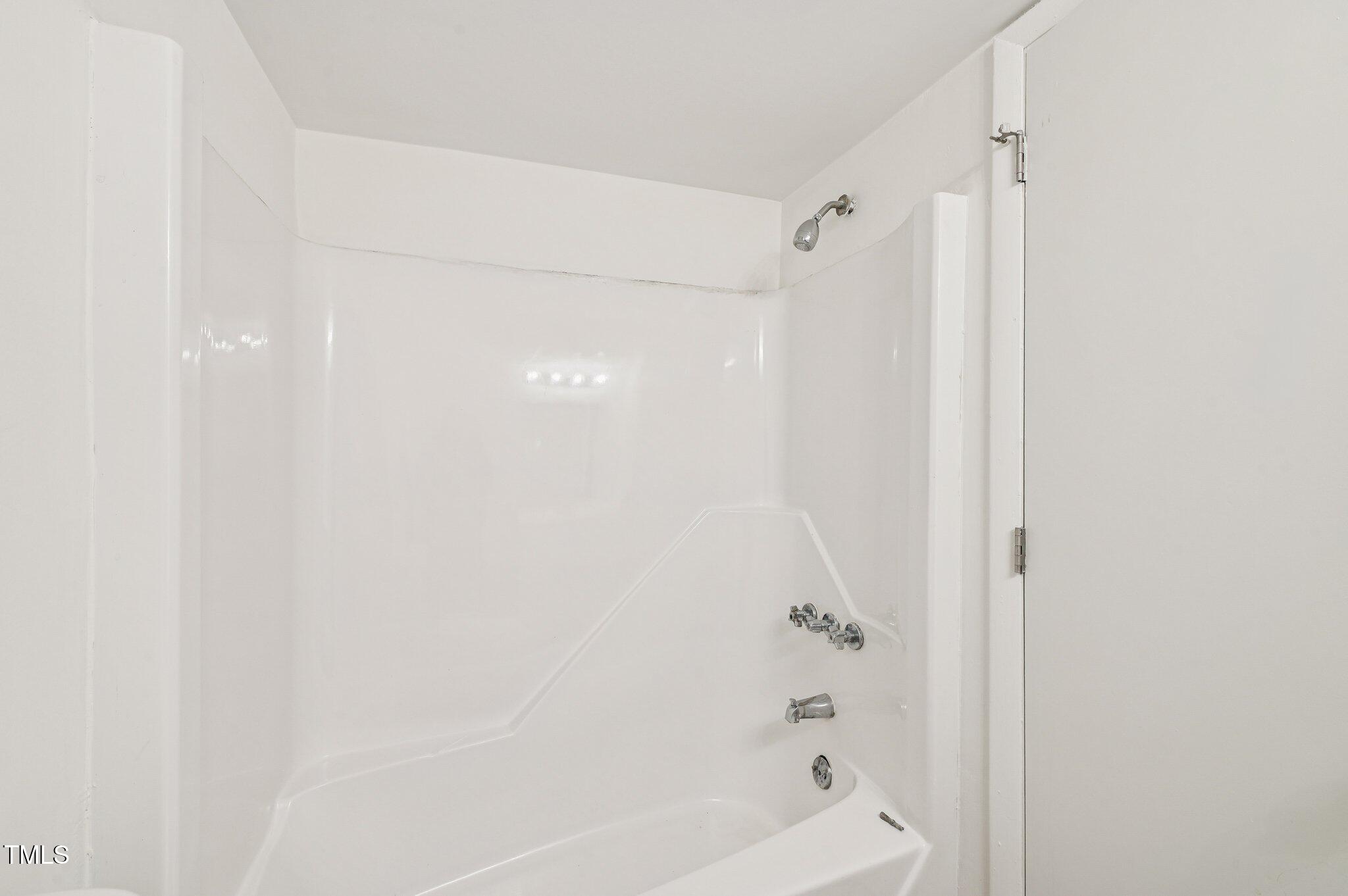 642 Pine Ridge Place Raleigh, NC 27609 - Photo 10 of 15 a bathroom with a bathtub