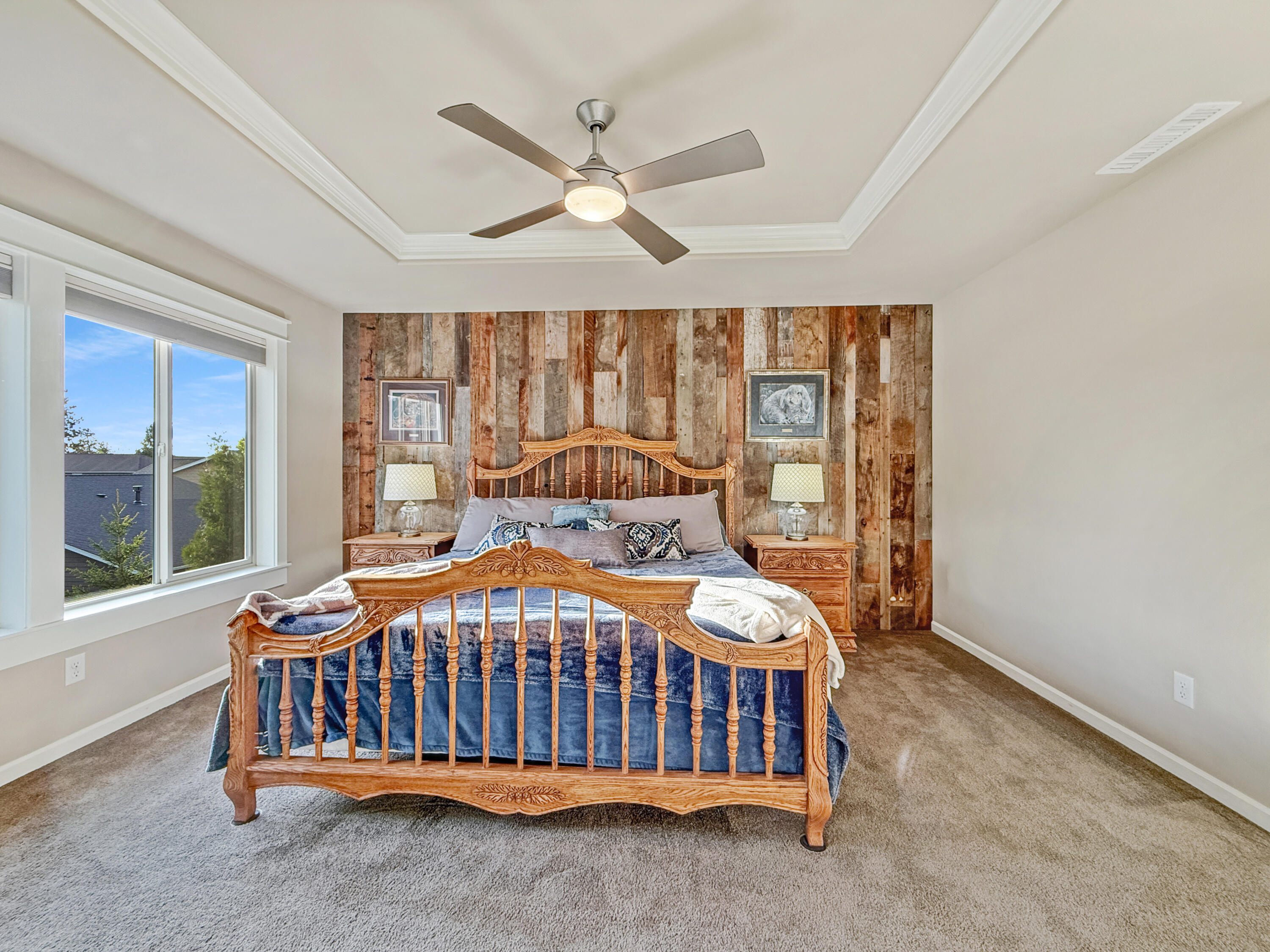 61072 Manhae Loop Bend, OR 97702 - Photo 22 of 63 a bedroom with a bed and window